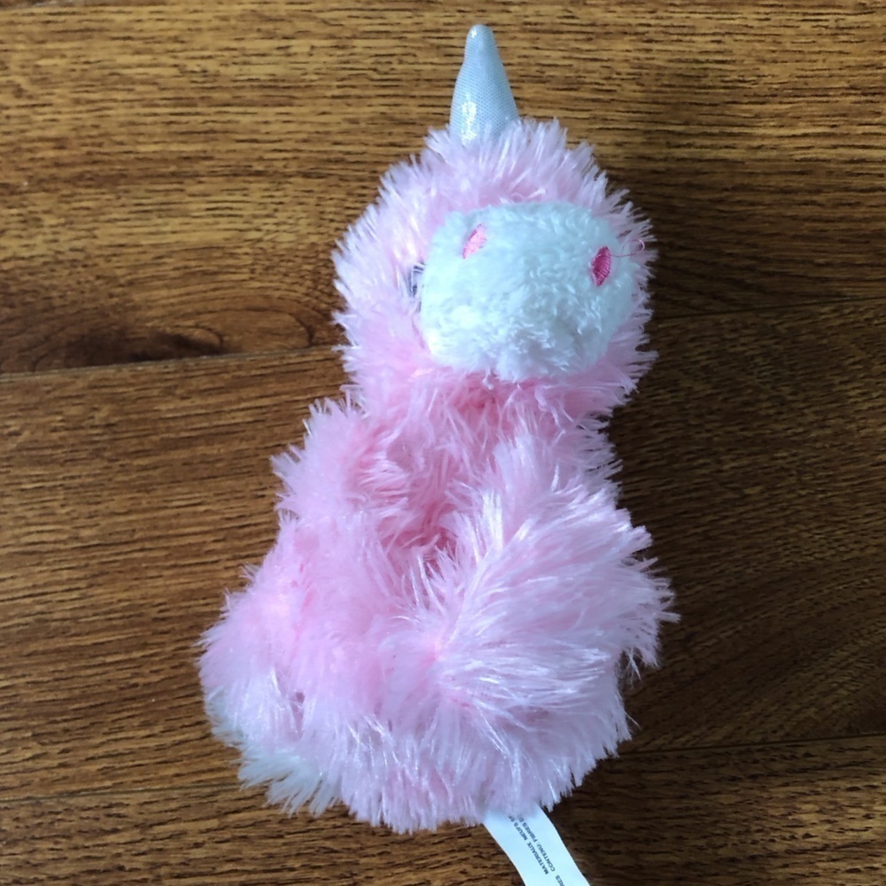 Small fuzzy pink unicorn plush stuffed animal